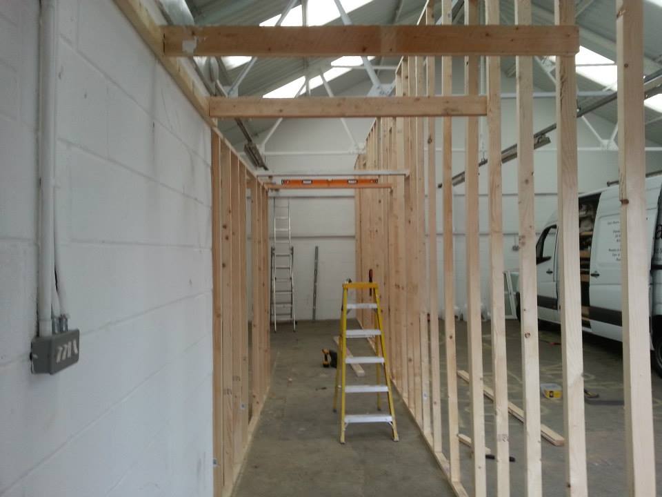 Studio walls being built inside the warehouse