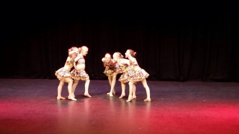 Dancers on stage in a show