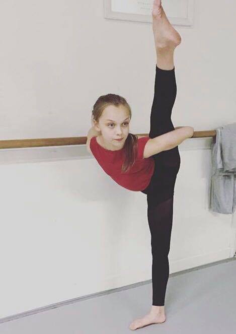 Dancer holding a standing extension