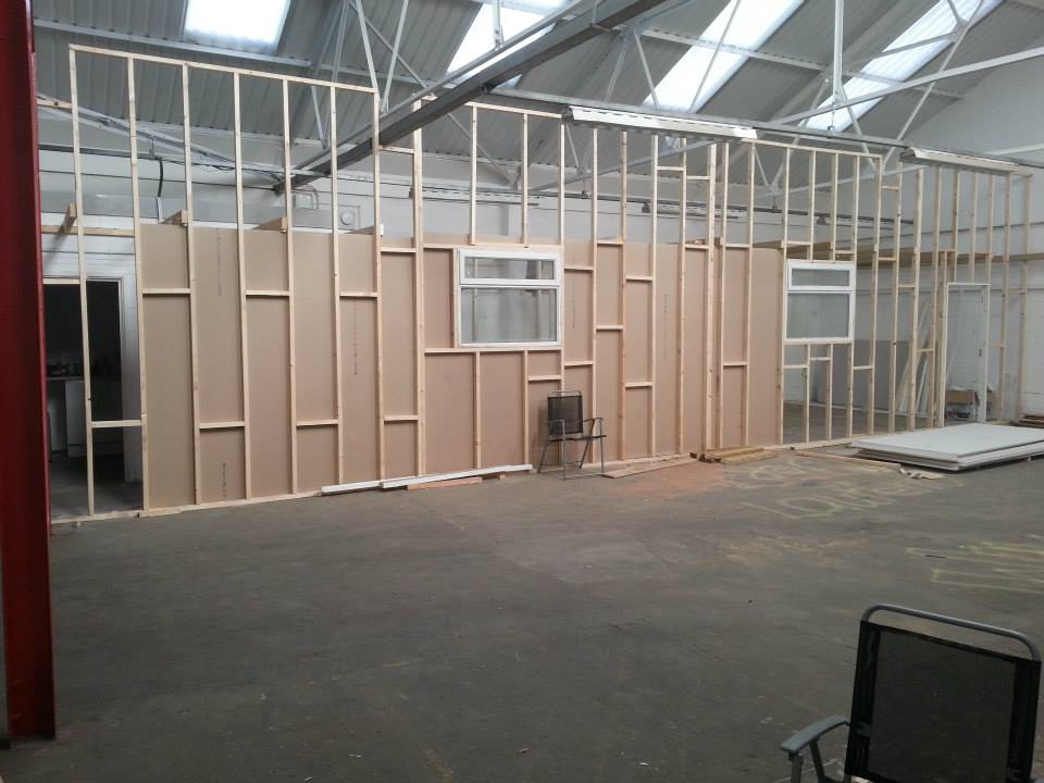 The empty warehouse before the studio was built