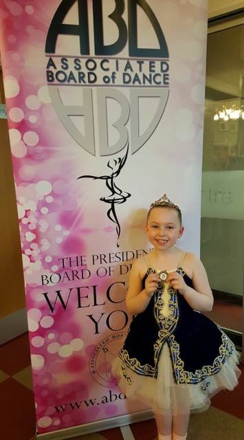 Festival soloist with her medal