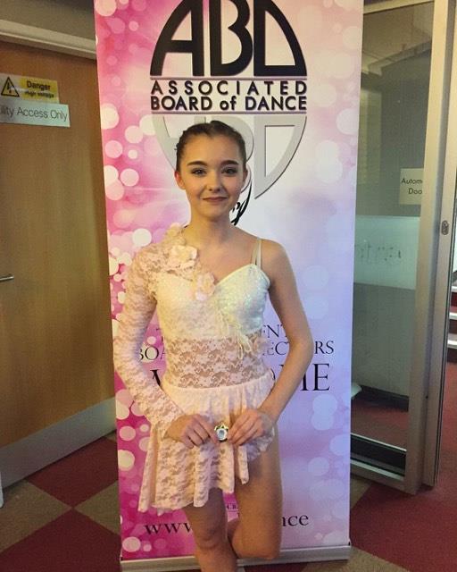 Festival soloist in a pale costume